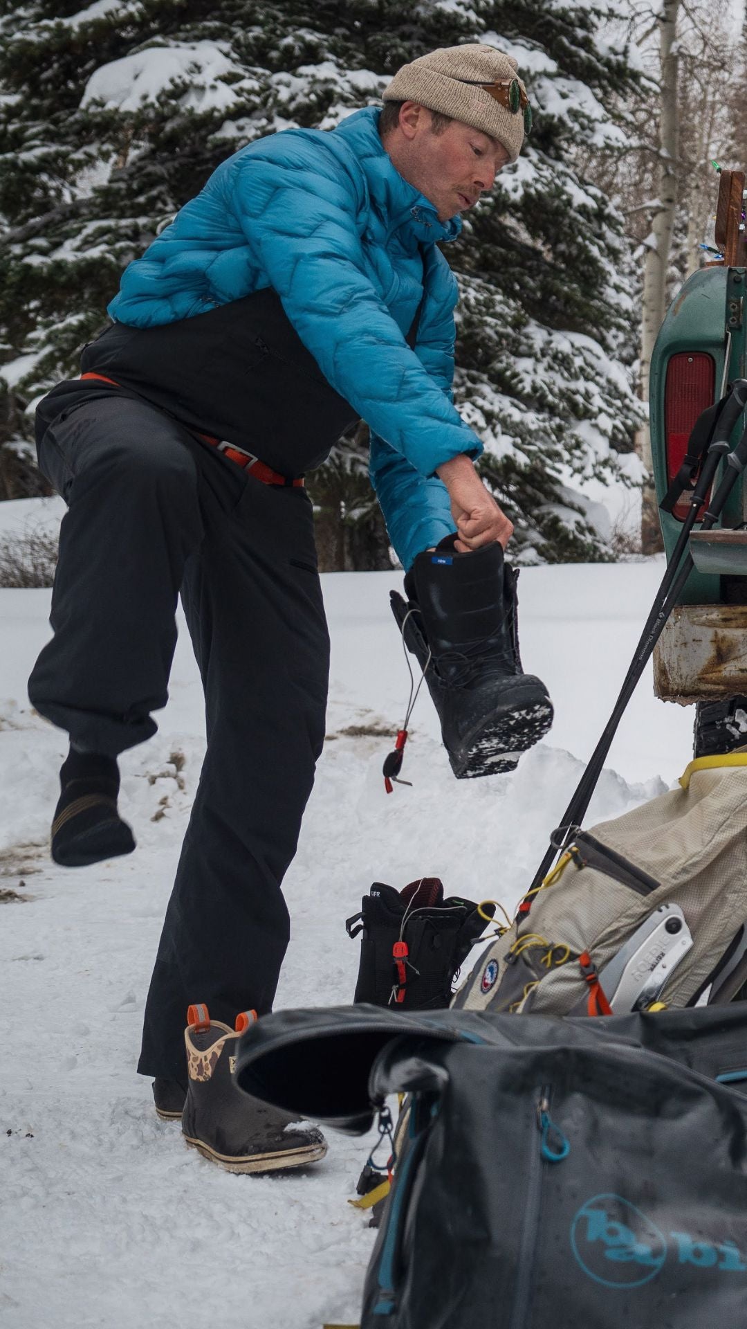 Getting boots on while wearing a zetto jacket